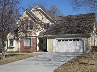 12001 Cherokee Ln, Leawood, KS 66209