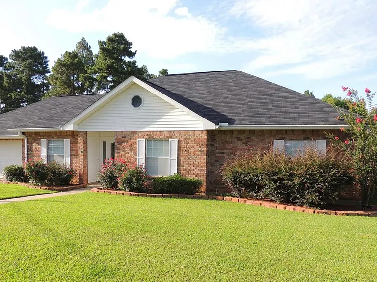 4801 Whispering Pines Loop — Photo 1
