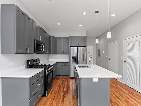 2nd image of 3122 N Broadway St #205