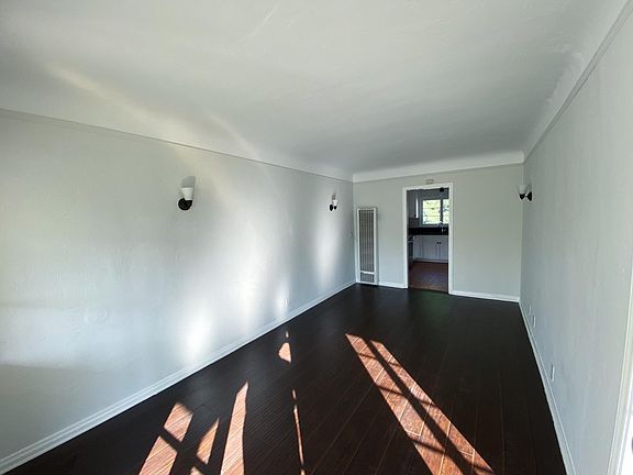 Spacious living room with great lighting from french doors