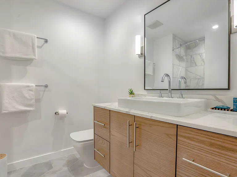 There is a full bathroom on the second floor of the condo.