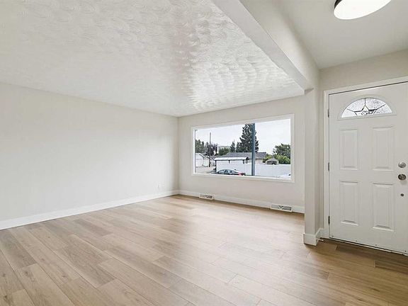 3rd image of 10415 E 8th St SW