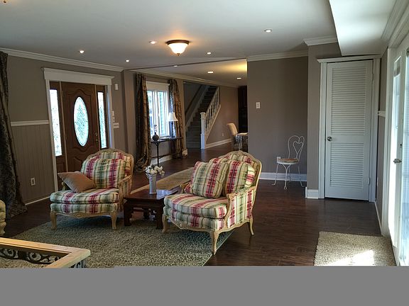 Living room with door to deck