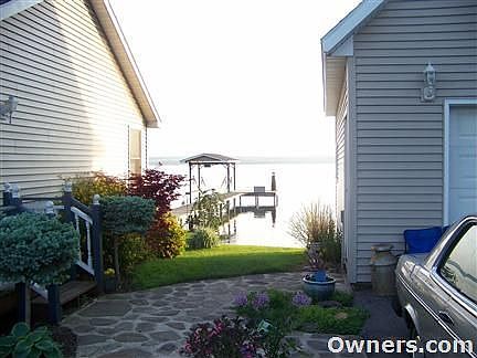 cobblestone walkways, front porch, landscaping