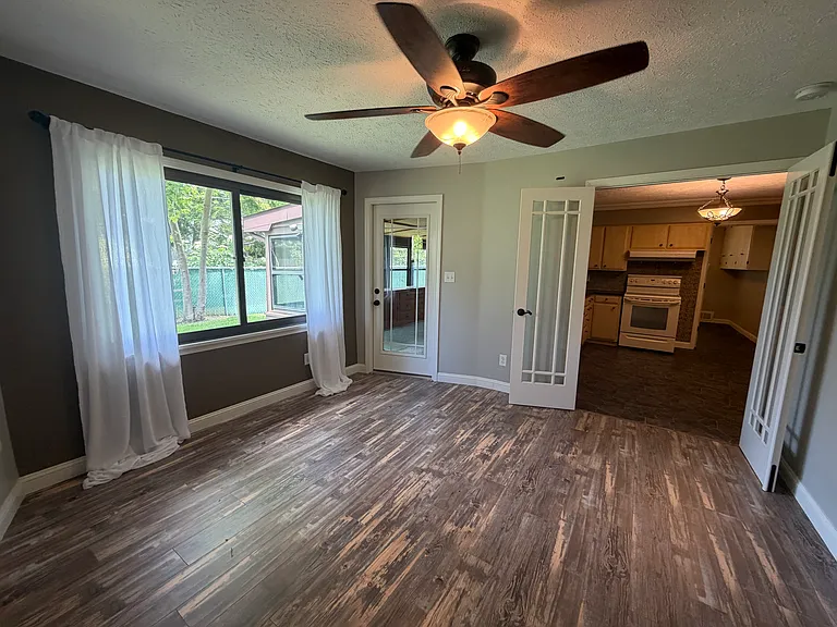 Extra room off kitchen and enclosed patio.