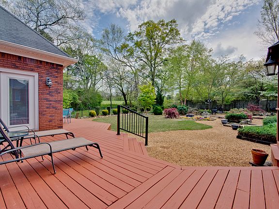 Deck overlooking backyard 