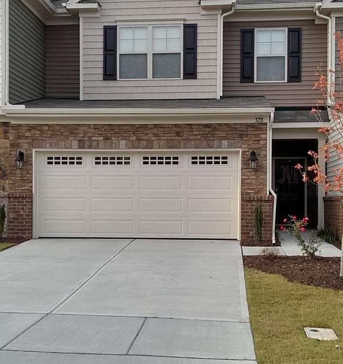 Front Entry w/ Attached Garage
