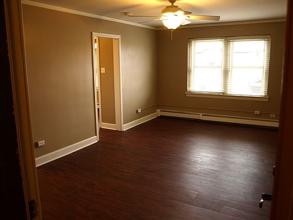 MAIN LIVING SPACE/ENTRY TO KITCHEN AND DINING AREA
