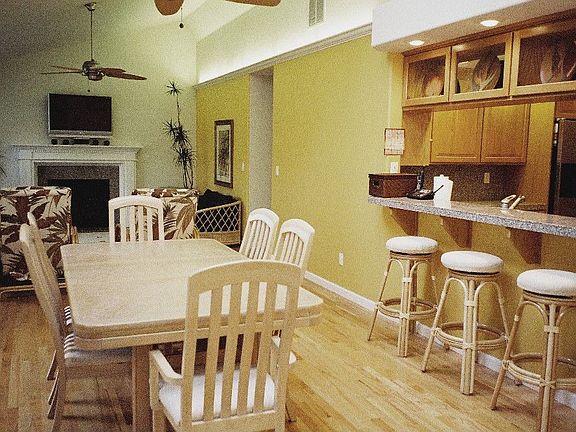 Great room with vaulted ceilings, hardwood floors