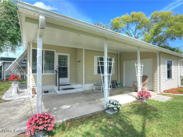 718 Hyacinth Cir, Barefoot Bay, FL 32976