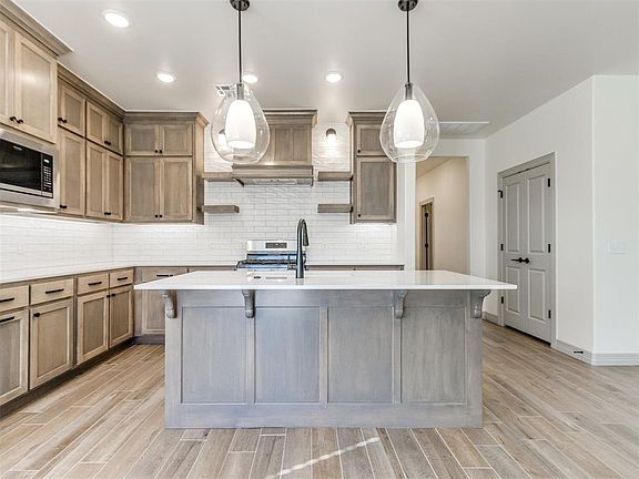 2nd image of 7716 Wilshire Woods Dr