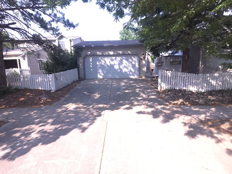 10308 W 81st Ave — Photo 1