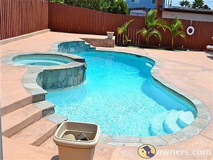 In ground salt water pool/spa with waterfall in private yard