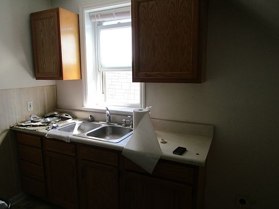 kitchen is in disawray being cleaned
