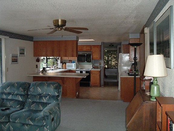 Roomy family room opens to kitchen