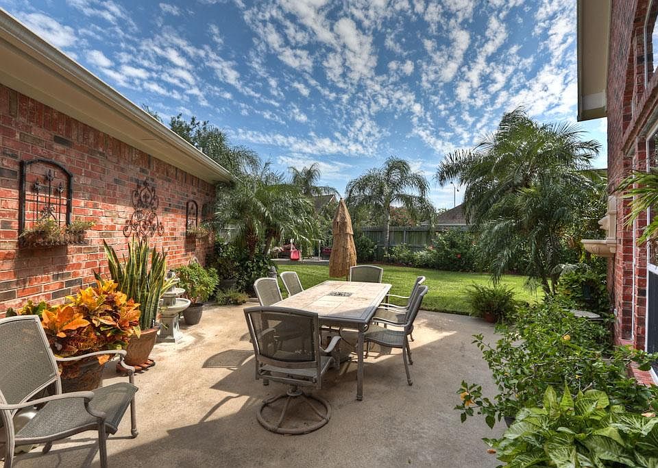 Between the home and double detached garage is an expansive Patio. A great place for family dinners, morning coffee, and for entertaining guests. The Patio is has close access to the indoors and can be viewed from the living areas.