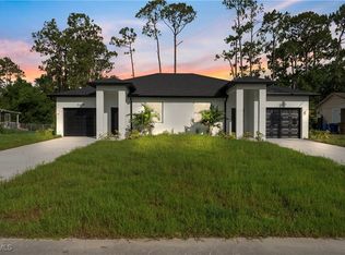 313/315 Ivan Ave S, Lehigh Acres, FL 33973