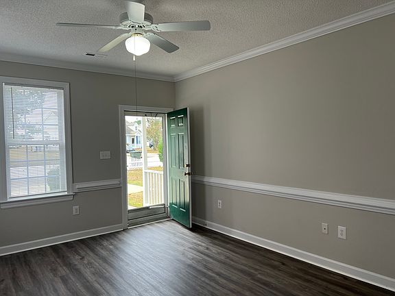 NEW LVP flooring in living room and hallway