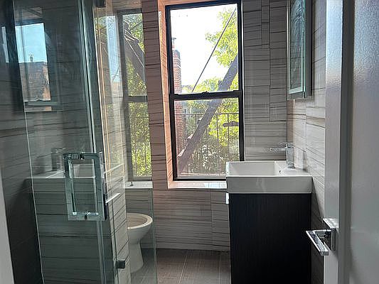 5th image of 411 E 118th St APT 35