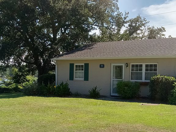 Outside (obviously -- left side of the duplex! Parking lot is a short walk to the right of the front door!