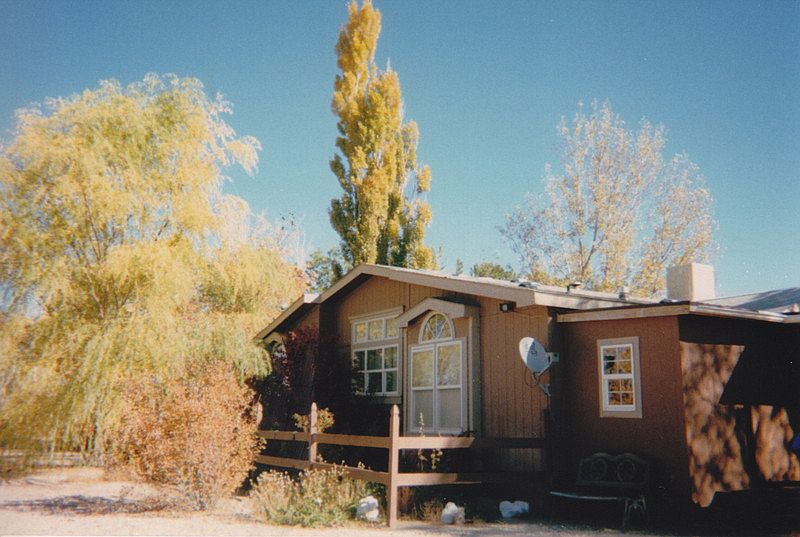 West side of house, showing back entrance addition.