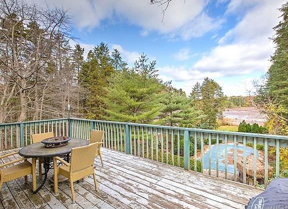 3rd fl deck: view of pool & lake