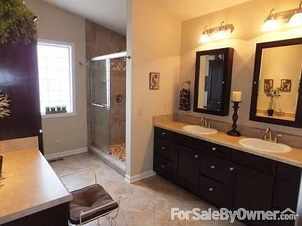 Living/Family room
						:
						Open floor plan from kitchen with hw floor, vaulted ceilings, premium lighting.