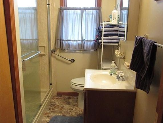 Nice bathroom with window for natural light and fresh air.