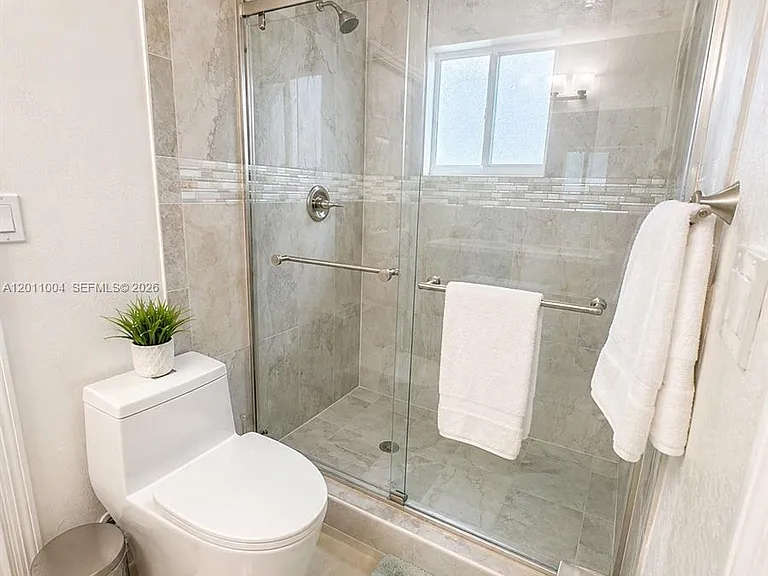 10290 SW 24th Ct — Photo 44