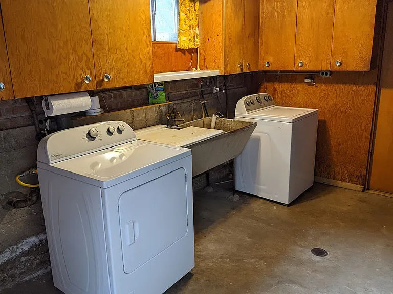 Bright and Clean Laundry with Large Utility Sink; Smart Smoke / CO Detectors Throughout Home
