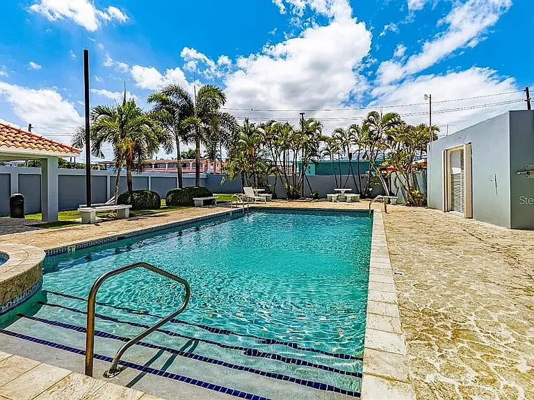 Beautiful pool with bathrooms for enjoying and entertaining. Also has a connected rentable community space.
