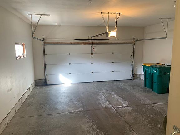 Plenty of room in the 2-car garage to keep your car out of the elements.