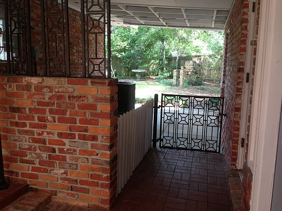 Breezeway to fenced backyard