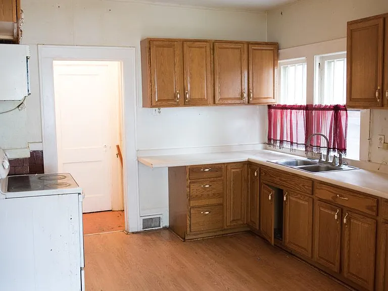 Kitchen with Stove, Refrigerator and Microwave