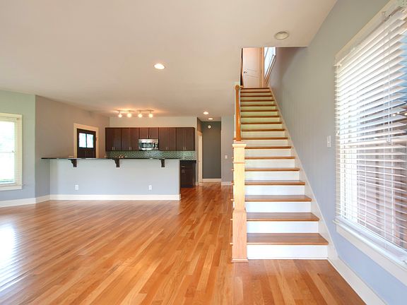 Beaming hardwood floors throughout the house