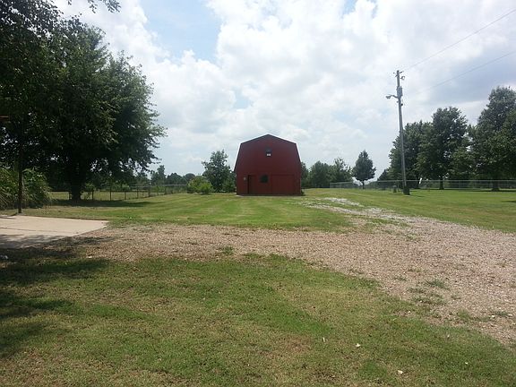 Long distance view of barn.