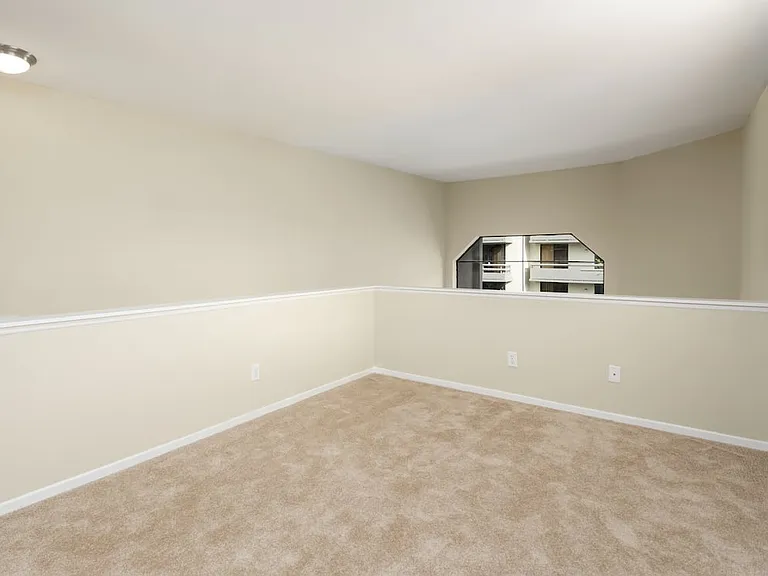 Loft area with carpet