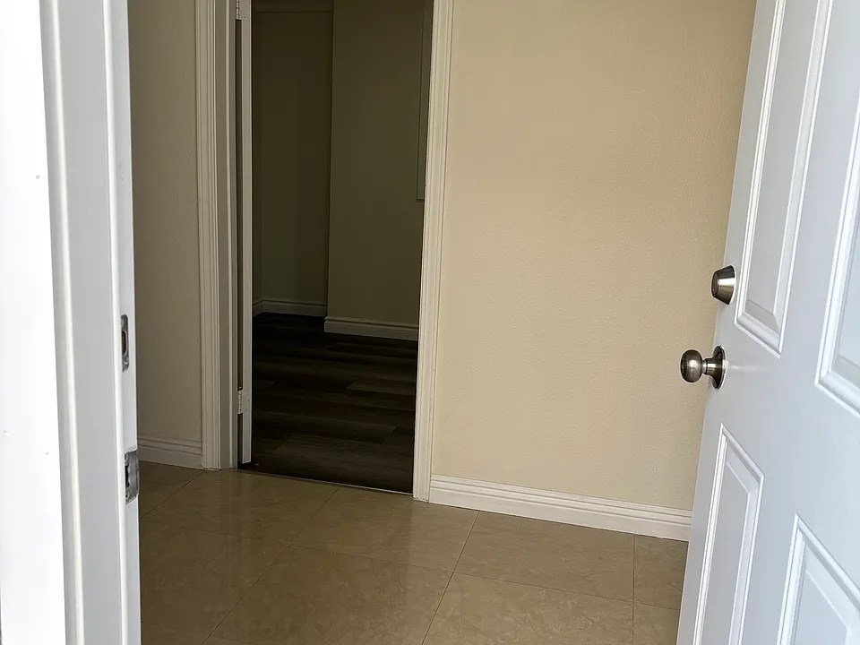 Through the main entrance, view of foyer.