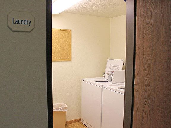 COMMON LAUNDRY ON EACH FLOOR AND WING.