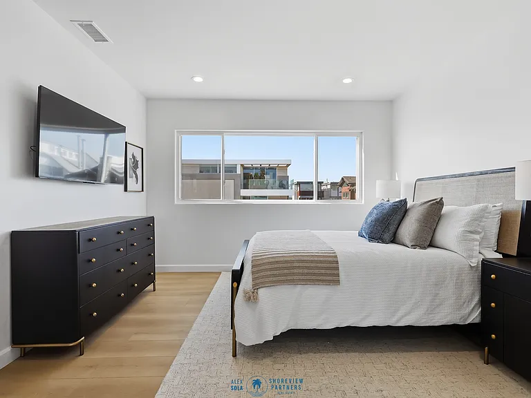 Bedroom 3 features full bathroom, large closet + storage room, and stunning ocean views.