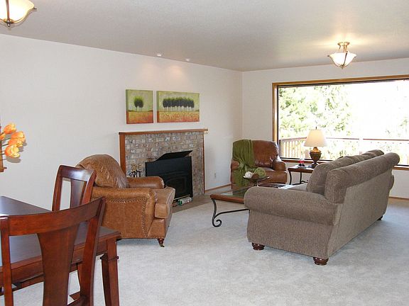 Living room also contains dining room space in this large area