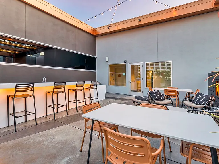 Rooftop with kitchenette and lounge seating