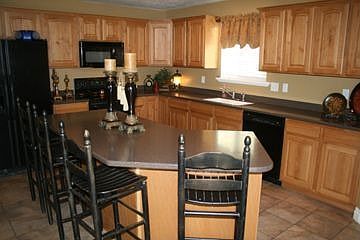 Spacious Kitchen with Island Bar