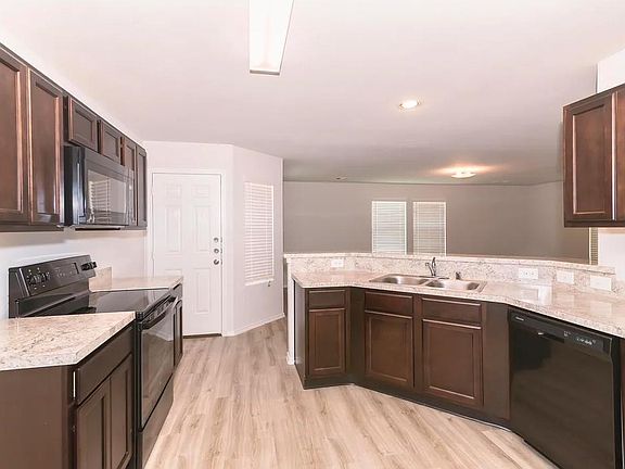 4th image of 6910 Enchanted Crest Ct #2