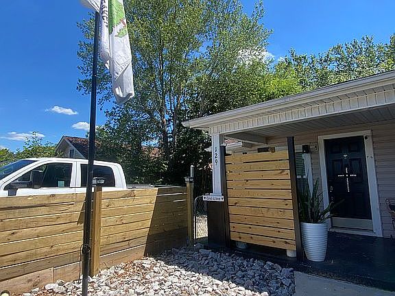 Front yard with flag pole