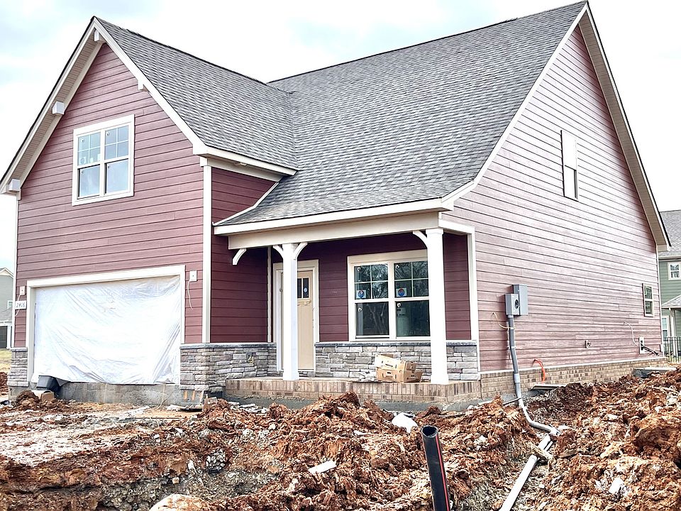 Beautiful James Hardie red siding with beige trim...she s a beaut Love this traditional style hous