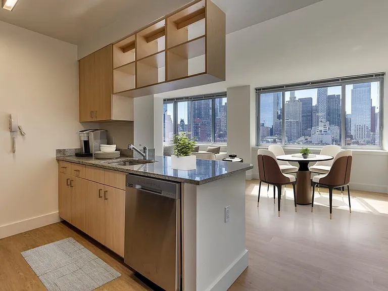 Renovated I South kitchen and dining room with hard surface flooring