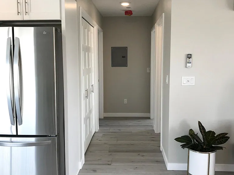 At end of hallway, Master BR is on left, 2nd BR is on right