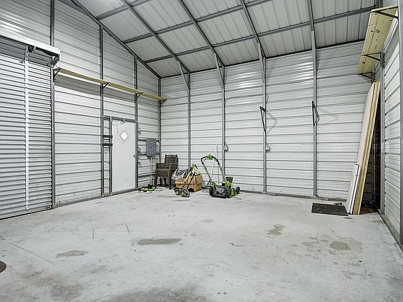 Massive detached garage metal shell building for an awesome gym, workspace, or storage.