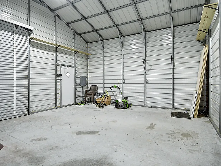 Massive detached garage metal shell building for an awesome gym, workspace, or storage.